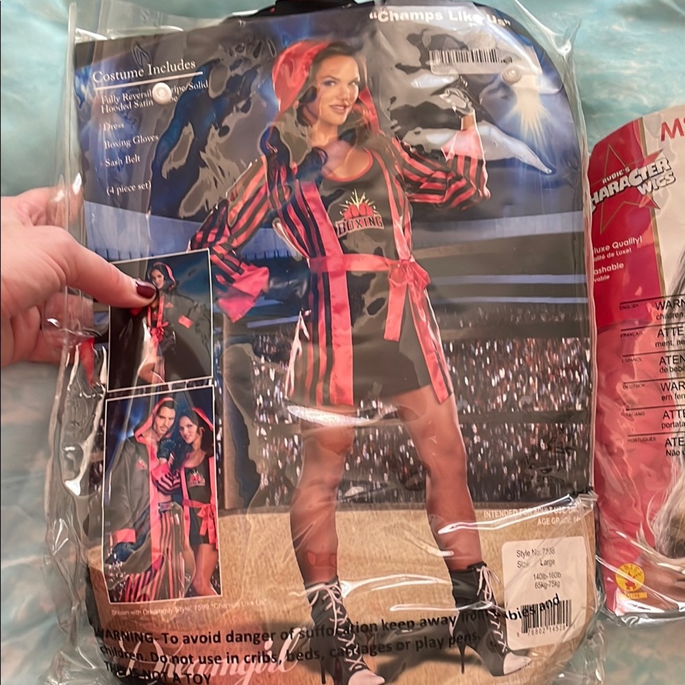 Boxing costume includes reversible solid hooded satin robe , belt and gloves